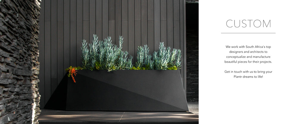 Plantr | Visi  magazine Custom Stainless Steel Planter and plant box. Black stealth steel pot plant stealth